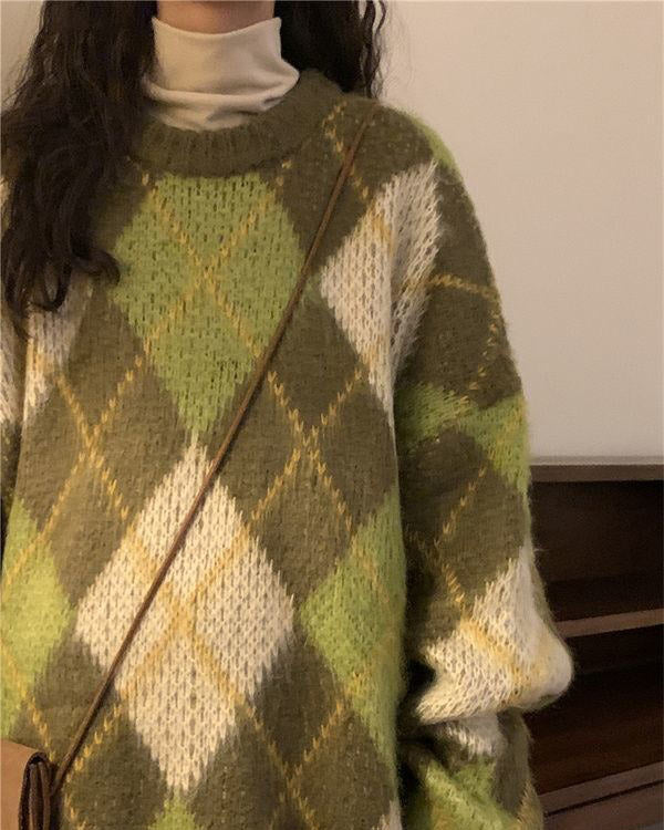 new student green argyle sweater